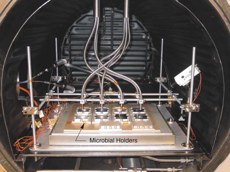 This photograph shows the inside of the MSC; visible are eight microbial holders attached to the upper surface of the LN2 cold-plates
