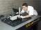 technician performing a calibration procedure on an Oriel monchromator